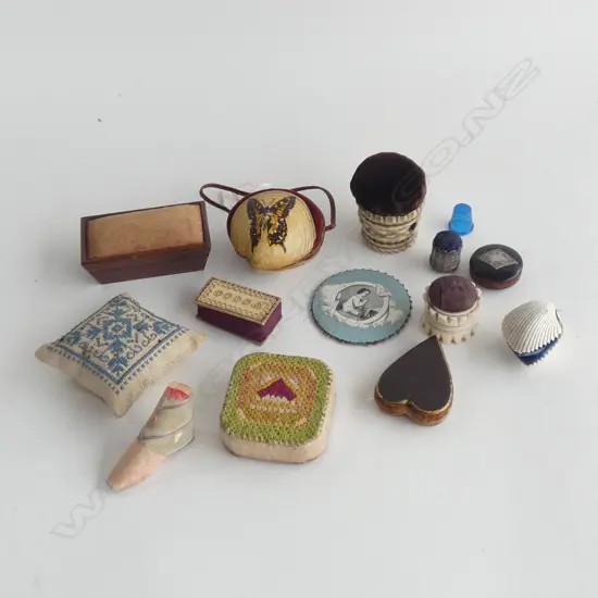Assorted antique pin cushions